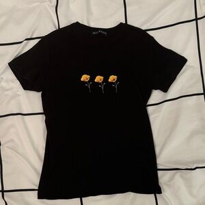 Brandy Melville Baby Tee with Yellow Floral Design